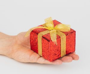 Person offering a gift