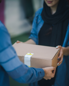 Person delivering package to someone