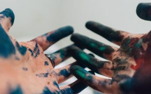 Hands with paint on them