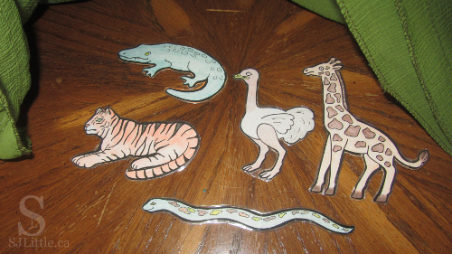 Zoo animal cut outs under cloth