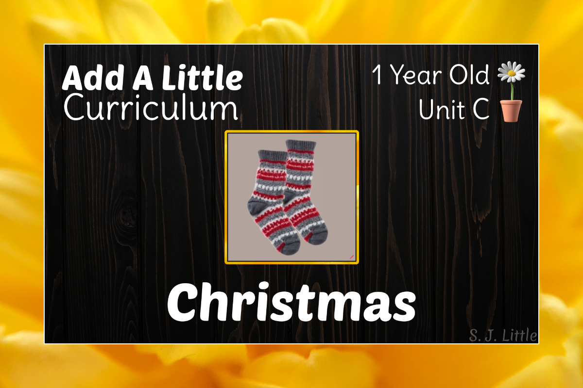 Picture of Christmas socks. Cover image for a curriculum for 1 year olds.